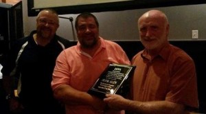 Frank Allen (right) receiving the IAWA Presidential Award of Merit from Steve Gardner (center) and IAWA President Al Myers (left). 