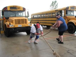 Lance Foster pulling a bus at the Gus Lohman Memorial Challenge back in his strongman days