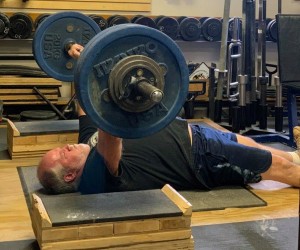 Greg Cook, the Overall Best Mens Lifter, performing a Hackenschmidt Press at the 2019 OTSM World Postal Championships. 