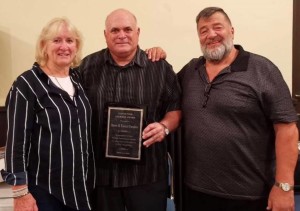 Steve and Karen Gardner receiving the Ciavattone Award from Frank Ciavattone at the 2019 IAWA Worlds.