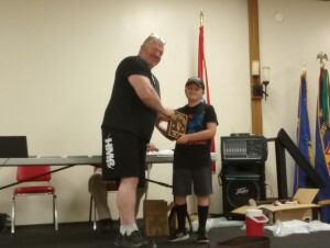 Eric Todd receiving the leadership award